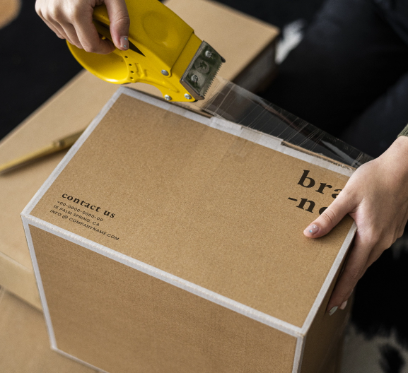 small business owner packing product parcel boxes delivery