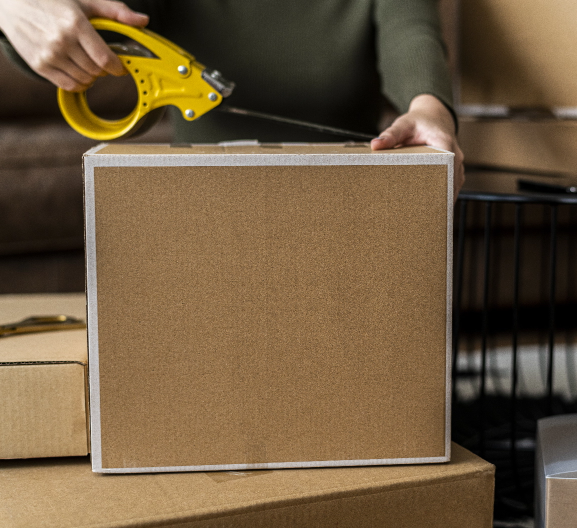small business owner packing product parcel boxes delivery